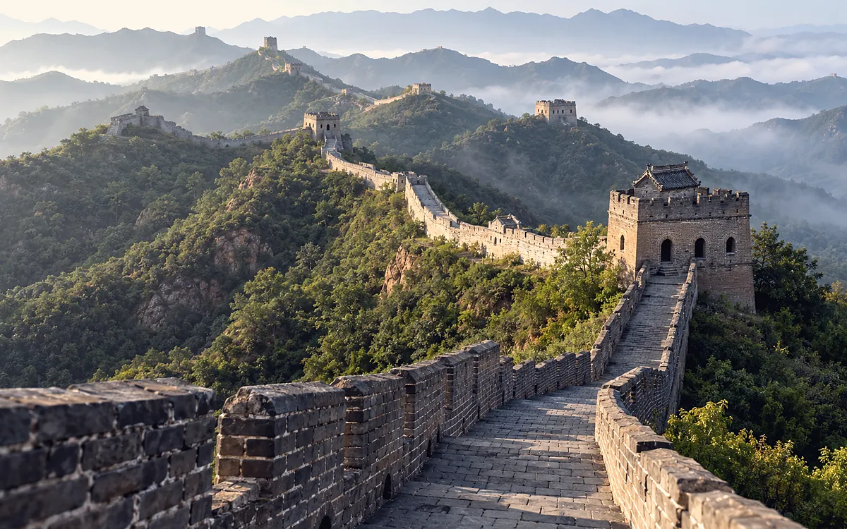 The Great Wall at Mutianyu winding over green hills