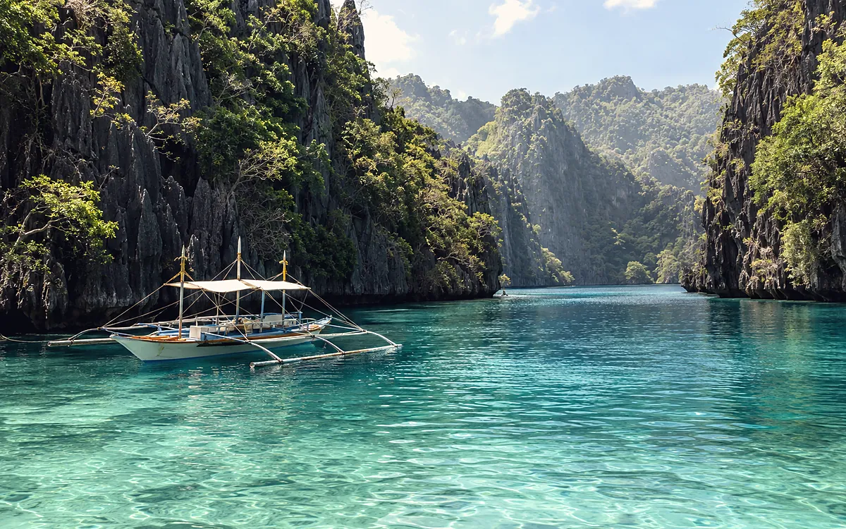 Palm trees over a beach at El Nido, Palawan